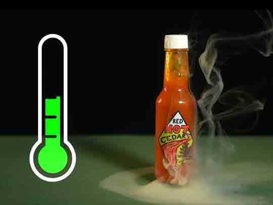 Hot sauce with curling smoke